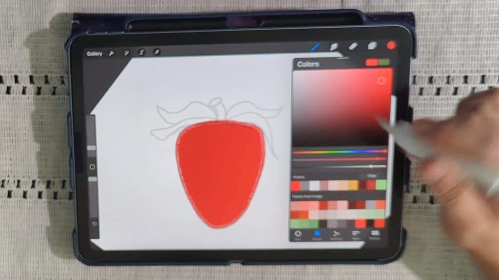 coloring a strawberry sticker in procreate