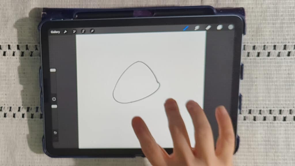drawing a squish triangle shape in procreate as a strawberry body