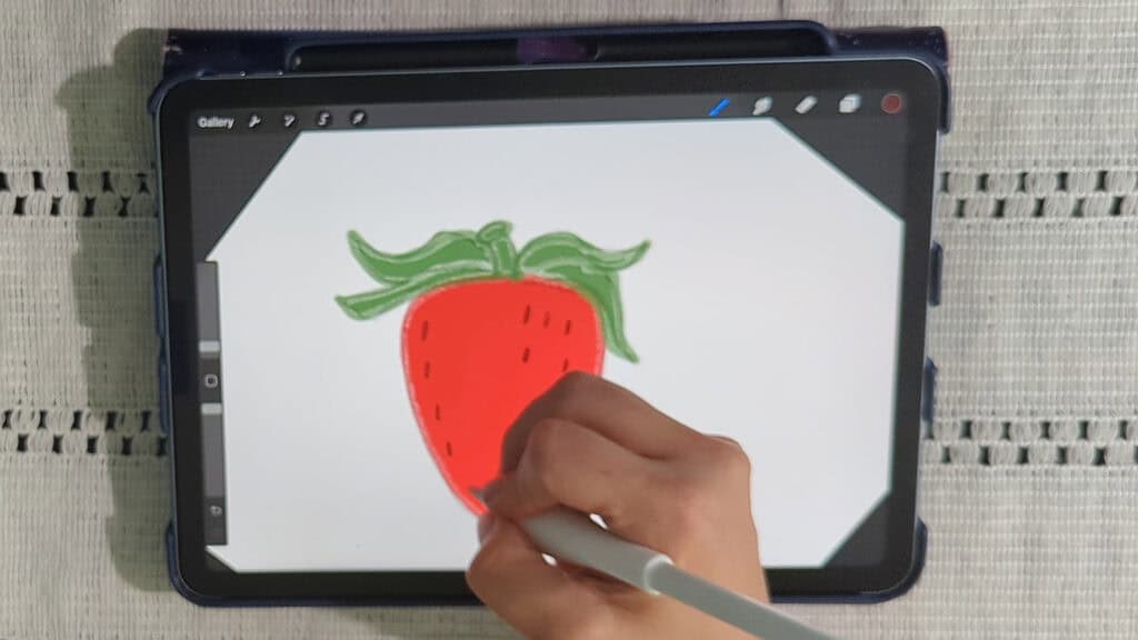 adding seeds to your strawberry