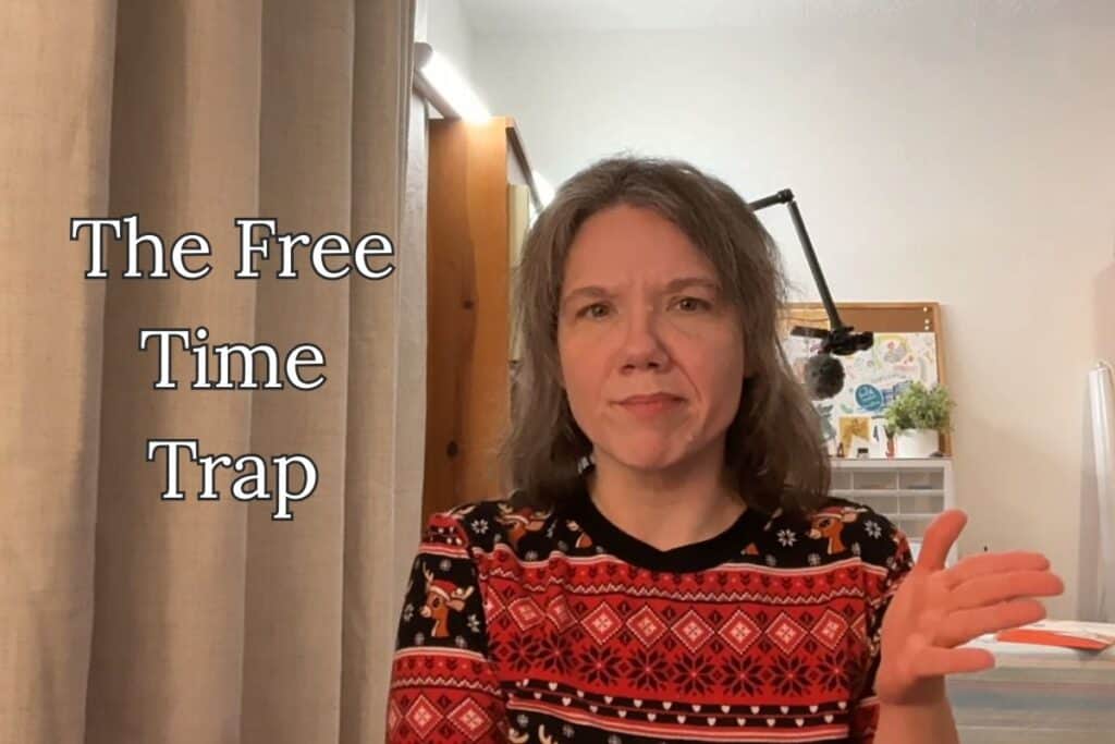 A woman in a red holiday sweater looks serious with one hand lifted, beside the text “The Free Time Trap,” capturing the frustration of wasted work windows.
