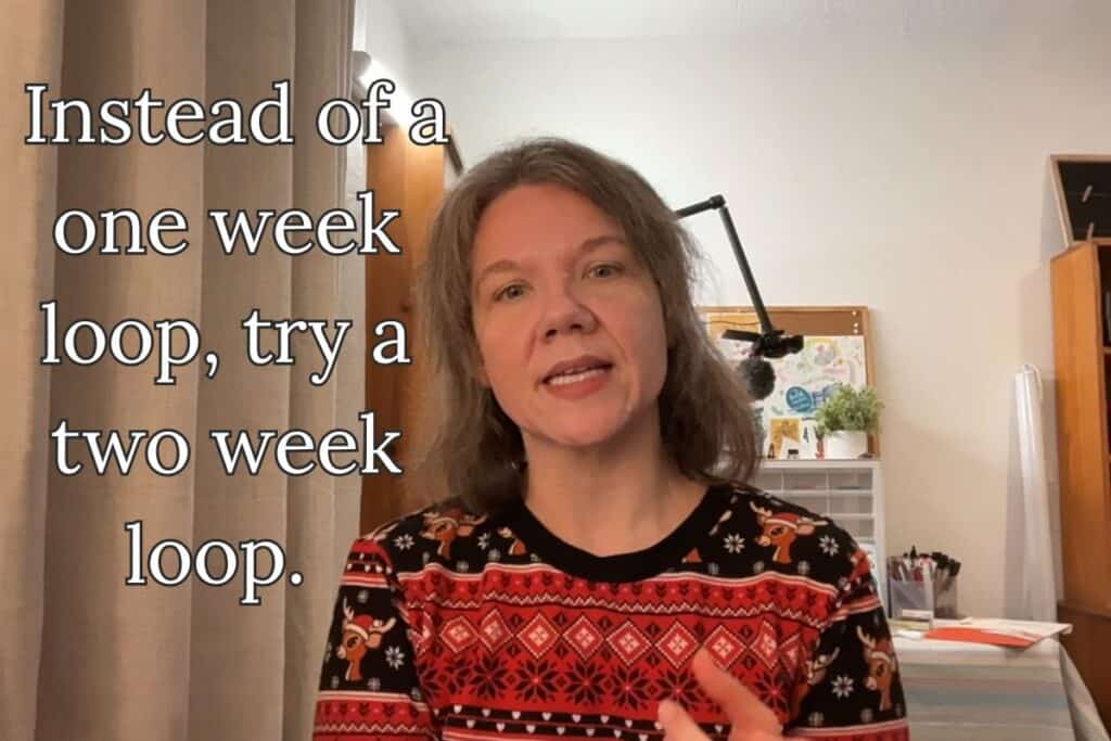 A woman sits calmly and explains scheduling options; the text overlay reads “Instead of a one week loop, try a two week loop.”